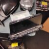 A cell phone is sitting on top of some other items.