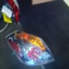 A car 's tail light is shown on the floor.
