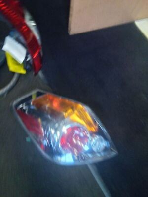 A car 's tail light is shown on the floor.