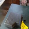 A gun that is sitting on top of a table.