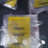 A bunch of packages wrapped in plastic and tied together