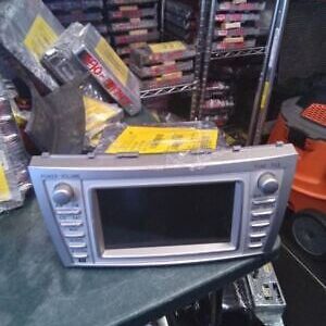 A microwave oven sitting on top of a table.