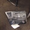 A car radio is laying on the floor