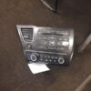 A car radio is shown on the floor.