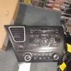 A car stereo is shown in the middle of a room.