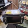 A car stereo is sitting on top of a table.