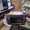 A car stereo sitting on top of a table.