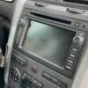 A car stereo with the radio playing an old video.