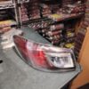 A car tail light sitting on top of a table.