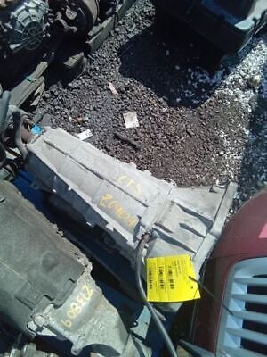 A piece of metal sitting on top of the ground.