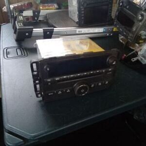 A radio sitting on top of a table.