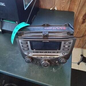 A radio sitting on top of a table.