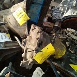 A pile of old parts with yellow tags on them.