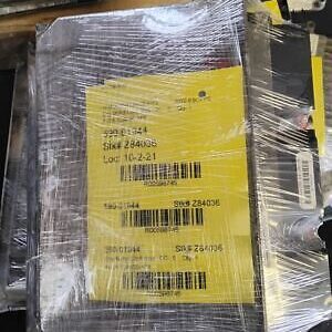 A package of electronic equipment wrapped in plastic.