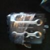 A bunch of wrenches are wrapped in plastic