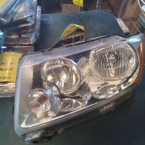 A close up of the headlight on a car