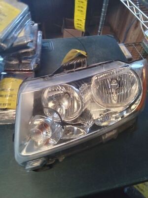 A close up of the headlight on a car