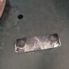 A piece of tin foil on the floor