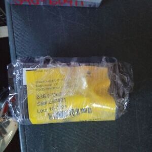 A package of yellow paper sitting on top of a table.