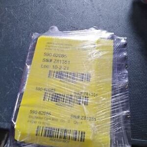 A package of yellow paper with barcode on it.