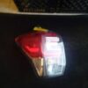 A red and white light on top of a table.