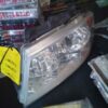 A car headlight sitting on top of a table.