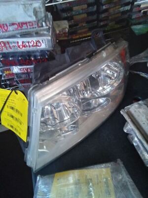 A car headlight sitting on top of a table.