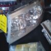 A close up of the headlight on a car
