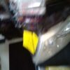 A blurry picture of a yellow object in the air.