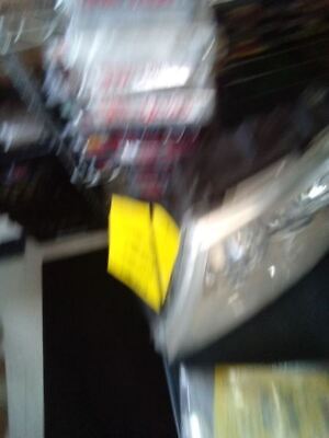 A blurry picture of a yellow object in the air.