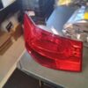 A red tail light sitting on top of a table.