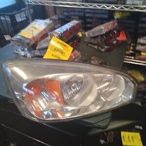 A car headlight sitting on top of a table.