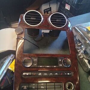 A car stereo with two speakers and one radio