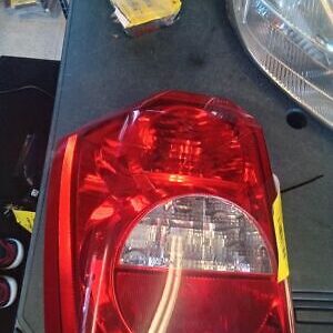 A car 's tail light is on the table.