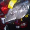 A close up of the headlight on a car