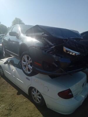 A car that is sitting on top of another car.