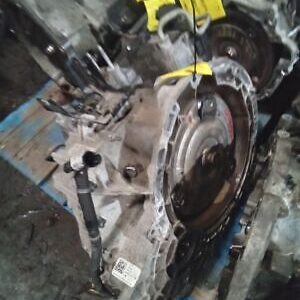 A car engine with some parts missing