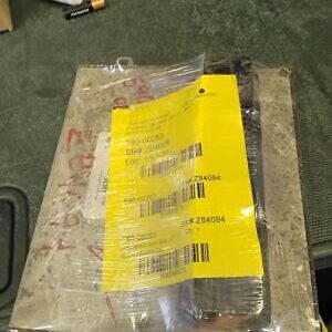 A package of electronics with a yellow tag on it.