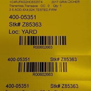 A yellow label with some numbers and barcode