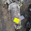A car engine with some parts missing.