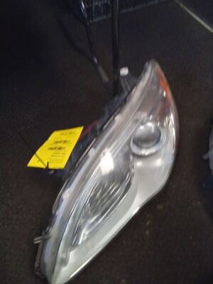 A car headlight with the price tag on it.