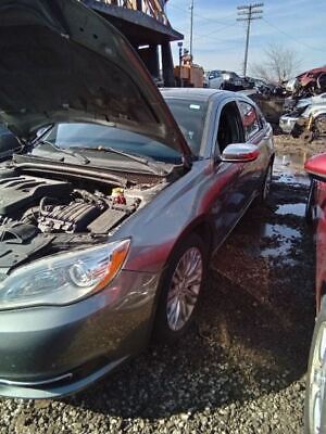 A car that has been broken down and is in the water.