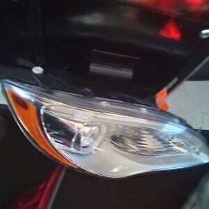 A close up of the headlight on a car