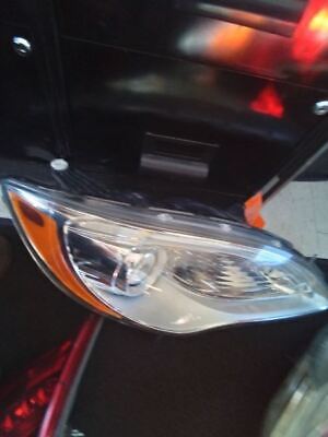 A close up of the headlight on a car