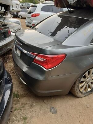 A car that is parked in the dirt.
