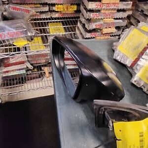 A table with some items on it in front of many stacks