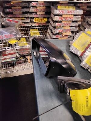 A table with some items on it in front of many stacks