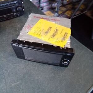 A black microwave sitting on top of a table.