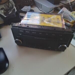 A radio sitting on top of a table.