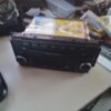 A car stereo is sitting on top of the table.